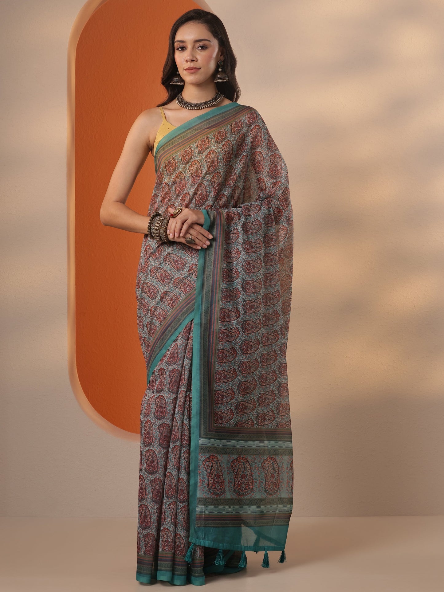 Teal Printed Silk Blend Saree With Unstitched Blouse Piece